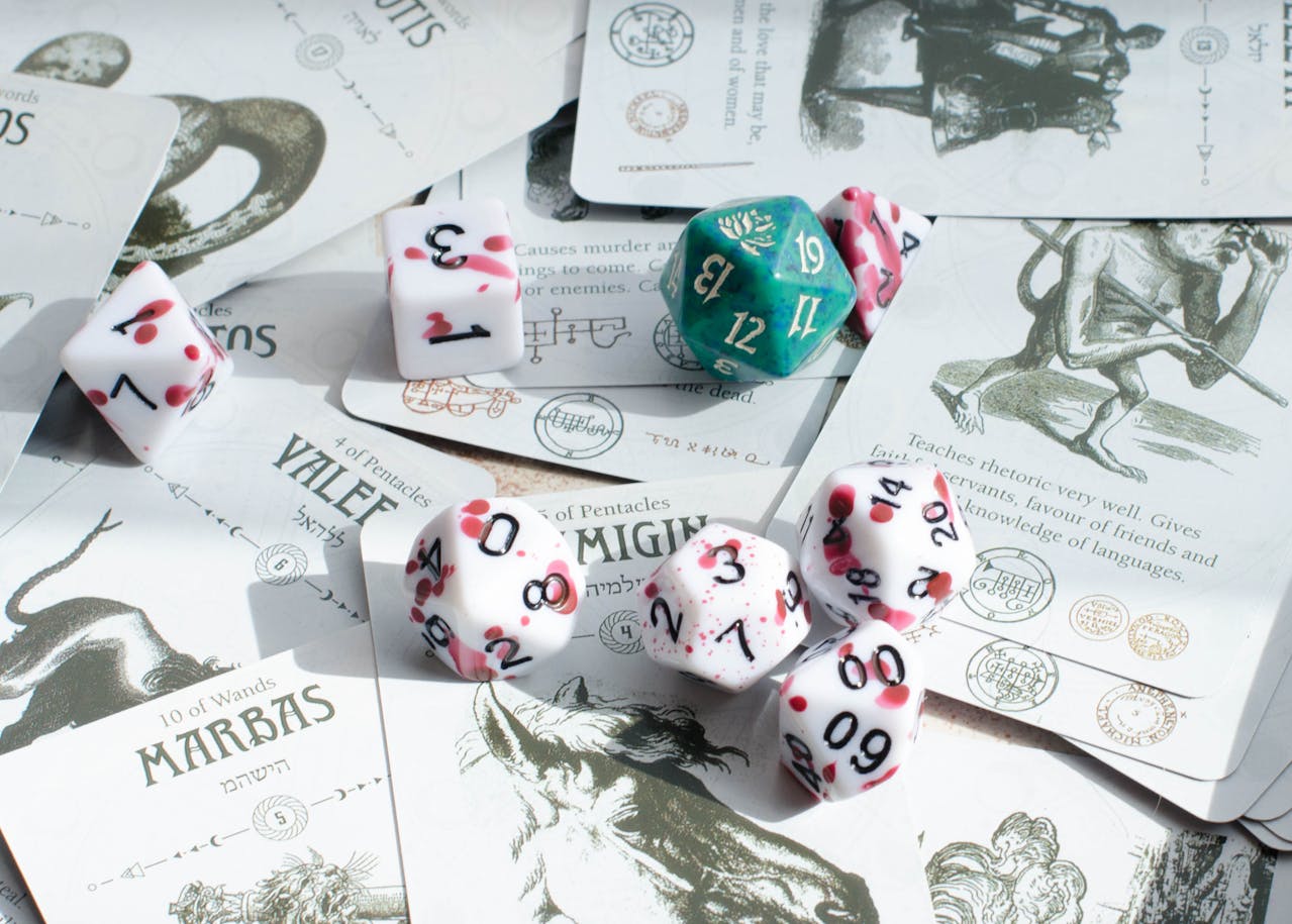 Our favourite dice set, perfect for combat encounters - white with blood splatter on the faces